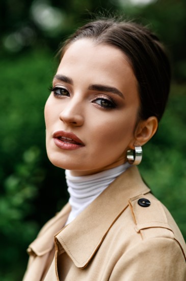 Classic looks including hoop earrings and trench coats are in trend.