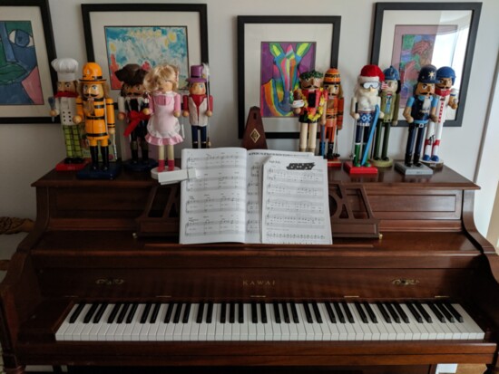 The top of a piano can be used to display holiday collections.