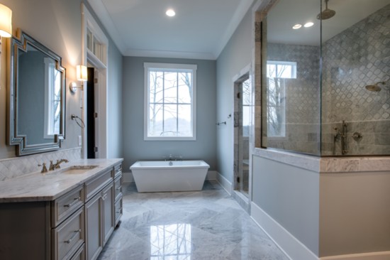 Integrate tile work in master bathroom