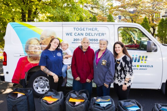 From left to right: Krystianna Aanonsen and her son Michael, Nick Marsico, Amanda Leggett, and Executive Director Janelle Larghi