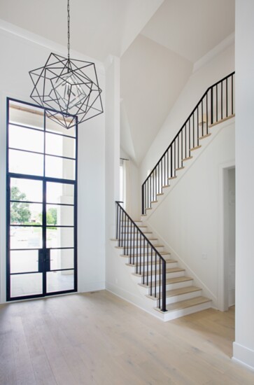 An elegant entrance and stairway are just a few of the many features that may be found in a Hannah Custom Home.