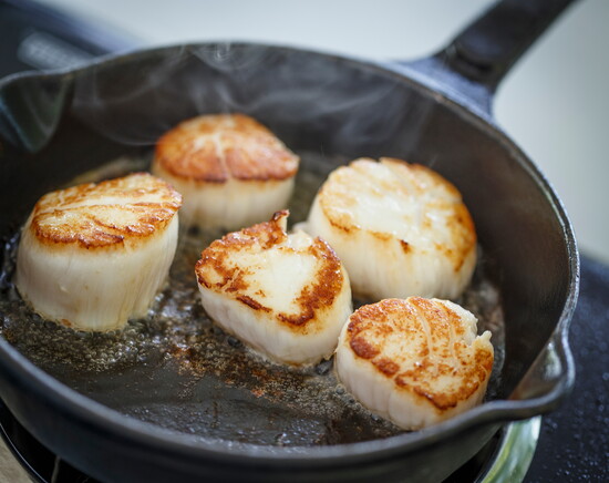 Grill your scallops over high heat until golden brown on each side.