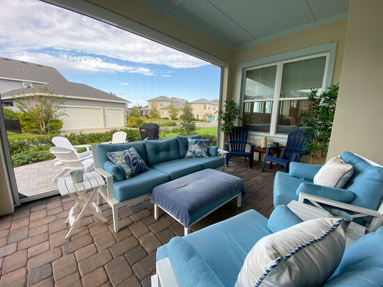 A cozy, blue modern lanai design.