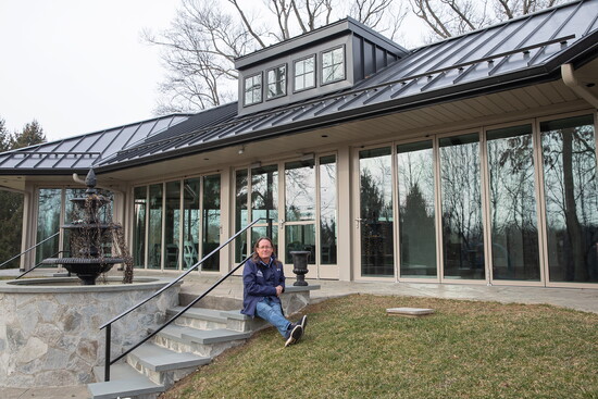 Paul Thompson in front of a property. Photo Credit: Kerry Dietz