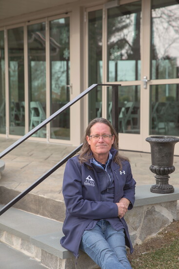 Paul Thompson in front of a property. Photo Credit: Kerry Dietz