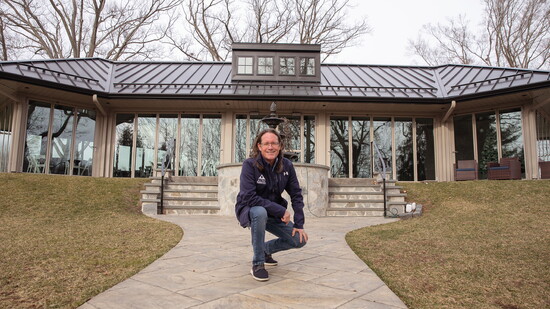 Paul Thompson in front of a property. Photo Credit: Kerry Dietz