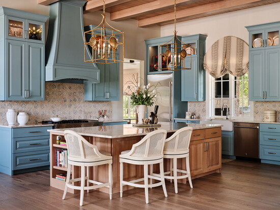 Layers of blue and natural wood bring color, warmth and depth to the kitchen.