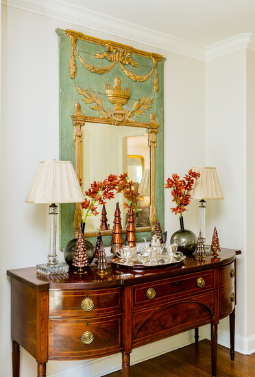 A simple, elegant display in warm corals and soft browns accented with antique silver