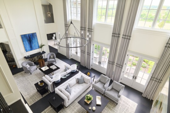 Example of two-zoned room. Interior design by Donna Hoffman/Impeccably Designed Homes.  Photo by Bartholomew Studios.