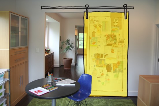 A sliding barn door provides a flexible partition