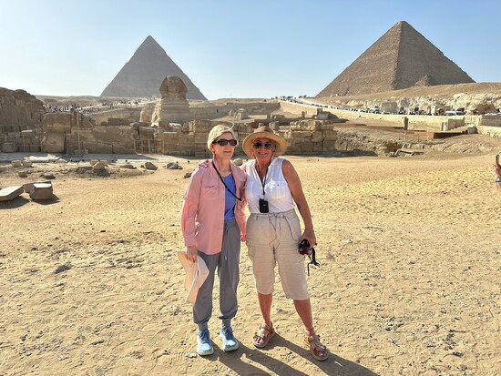 A travel guide took this photo of Susan Karther and Gwen Henry while visiting the Great Pyramids of Giza.