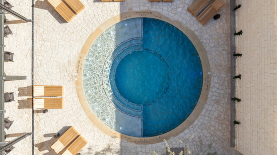 The property features a pool, multiple on-site restaurants and bars, a full-service spa, and on-site valet parking.