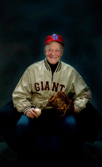 Rich Domich (wearing Willie Mays' old glove) shares a slice of America's pastime