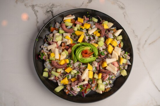 Try the Ceviche Tropical, a traditional mix of of fresh shrimp, octopus + tilapia 