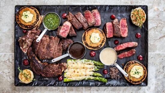 The custom steak board at TRIS may include an array of cuts, including the restaurant's signature Texas Gyulais wagyu, which Chef Austin partnered to develop.