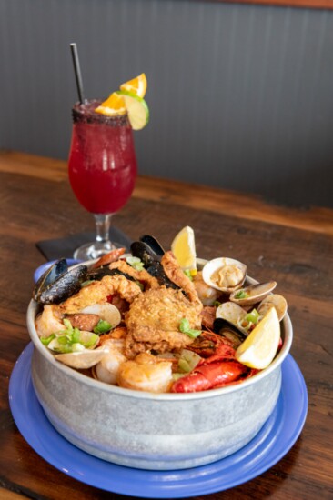 The low county boil is topped is seafood-rich and topped with a fried soft-shell clam. 