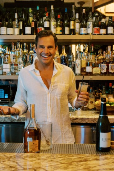 Behind the bar at Aba mixing up a cocktail with Giuliana's namesake prosecco