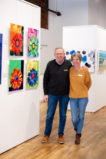 Bill and Staci McLauchlan by their work entitled "Flowers in Bloom."