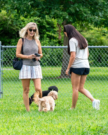 Eileen Minton and Ella Angell are having a great afternoon at Samson's Dog Park.