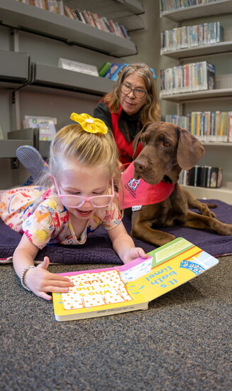 Izzie with her volunteer handler Jan Abramson 