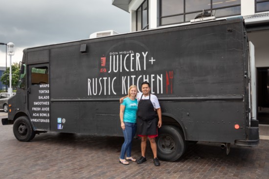 Jackie and Miguel Martinez pose by their food truck.