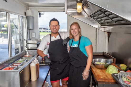 Miguel and Jackie Martinez show off the inside of their food truck.