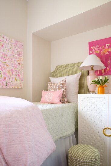 Neely's original art brings every fabric choice together, brightening up the otherwise white walls.