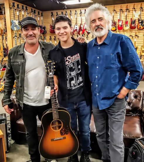 Jake (Center) at Norman's Rare Guitars in LA with Jason Sinay of The Dirty Knobs (left), and Ron Blair of The Heartbreakers (right)