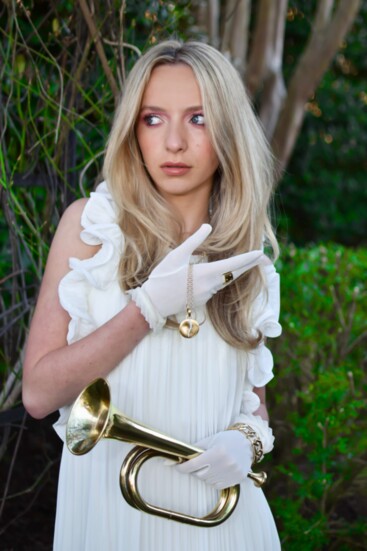 White Rabbit in pleated dress from Saks Fifth Avenue; necklace by Marco Bicego from Loring&Co.