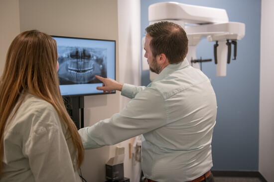 Natalie Fishback, Administrative Assistant and Dr. Wood, combine advanced technology with a patient-focused approach.