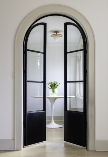 Another showstopper, the archway and steel doors to one of the two home offices.