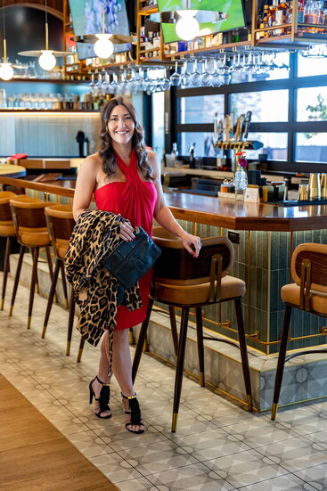 Red halter dress by LAUNDRY; leopard coat by Marc Jacobs; clutch by Marc Jacobs; fringe heels by Chloe