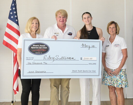 STSCC Benevolent Committee members gather around scholarship recipient Riley Sullivan (L-R): Sandy Ferega, Ron Wencil, and Linda Wencil.