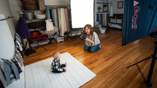 Kristen Rath photographing her little model