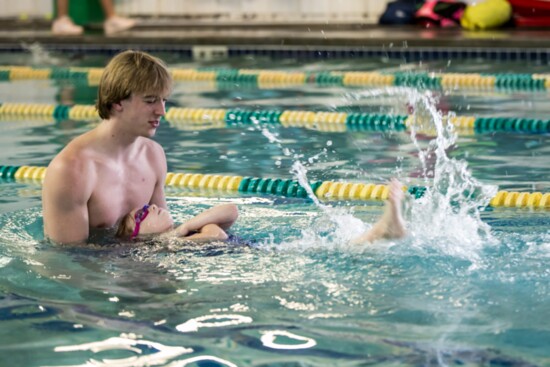 Young swimmers learn water safety.