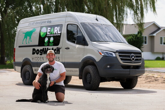 Jack Earl, owner of Earl Outdoor Solutions and DogWatch Omaha with his dog, Bentley 