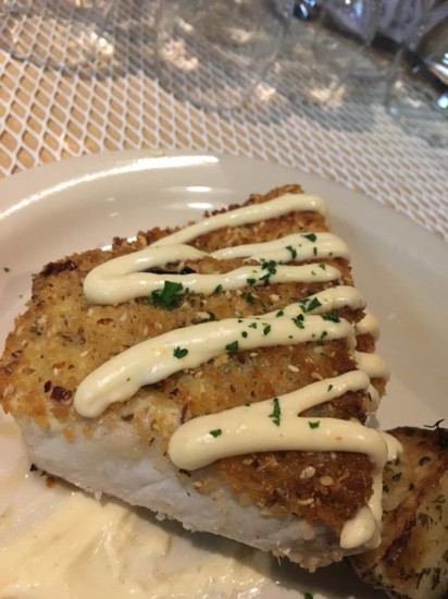 pistachio nut-crusted fresh sea bass topped with a Meyer lemon creme fraiche 