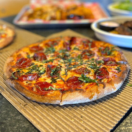 Ramundo Pizza Famiglia offers classic Italian flavors with a twist in their Gino's Hot Pepperoni pie.