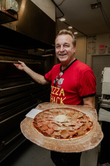 Bob Protexter with a pizza straight from the oven...yum!