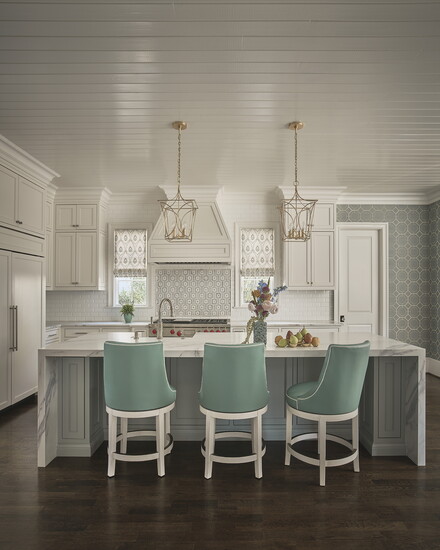 “The palette is soft and tranquil, featuring layered lavenders, greens, and watery aquas that create a sense of ease and quiet sophistication throughout 