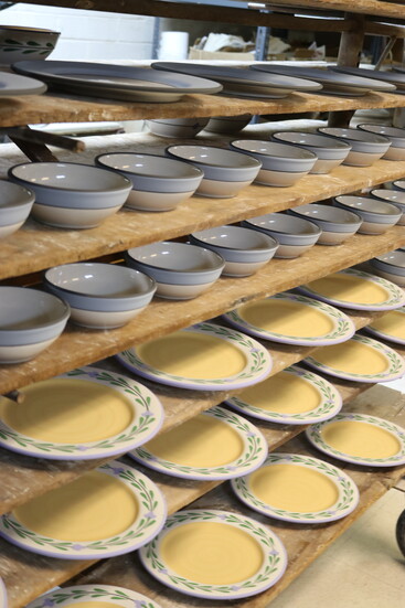 Freshly painted plates and bowls