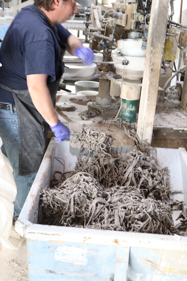 The rounds and other shaped plats are then trimmed to spec.