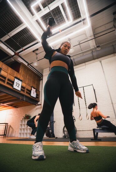 Person working out at Uplift. Photo Credit: Ryan Knutsen