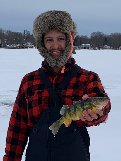 Conrad Baker with a striped pike
