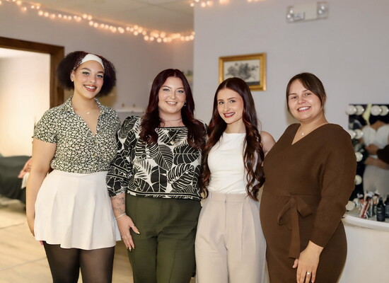 the owners of The Beauty Loft posing at the Denville business