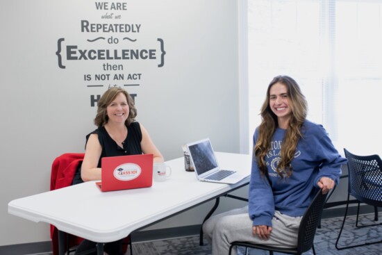 Instructor and Co-Owner Karen DeRosa with a student. 