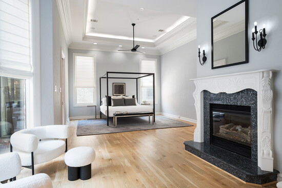 Primary suite with sitting area and fireplace