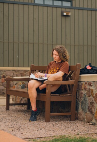 Kallan McKinney, a creative writing student, says OSAI is "more than just an arts camp, it is a place full of love." (Photo by Los Flores)