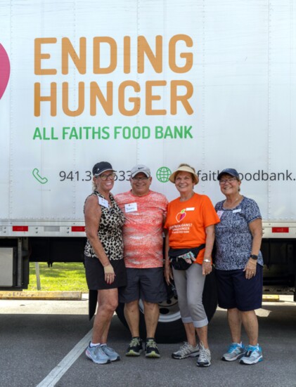 Volunteers at a mobile pantry at Venice Middle School.