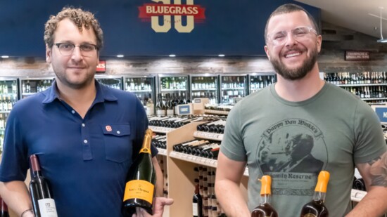 Bluegrass Beverage Sommelier Kenneth Skutnik and General Manager Jake Richardson displaying some of their favorite holiday wines and spirits.